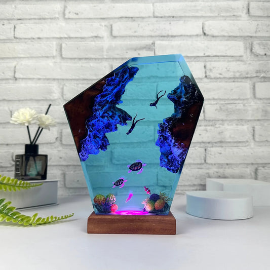 Decorative lamp in the shape of a turtle family, made of epoxy resin.