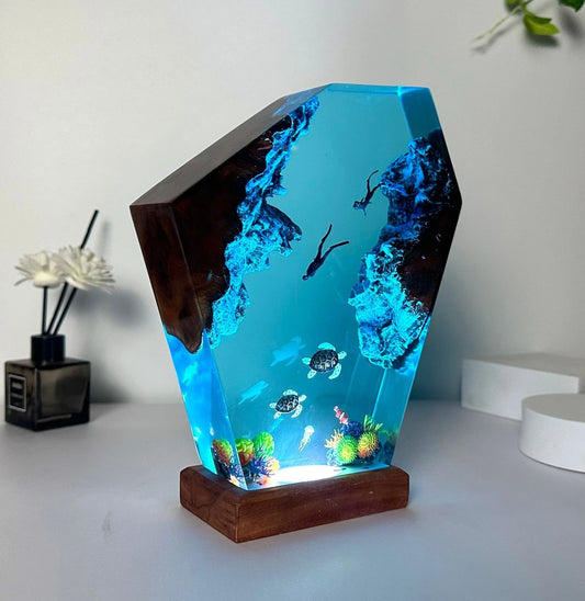 Decorative lamp in the shape of a turtle family, made of epoxy resin.
